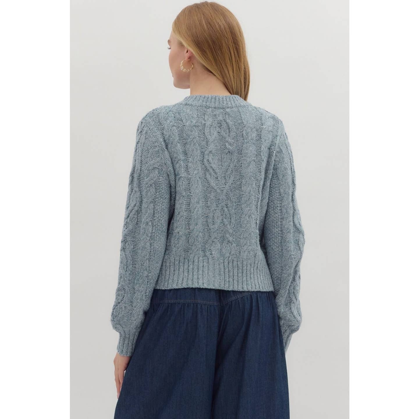 The Melania sweater