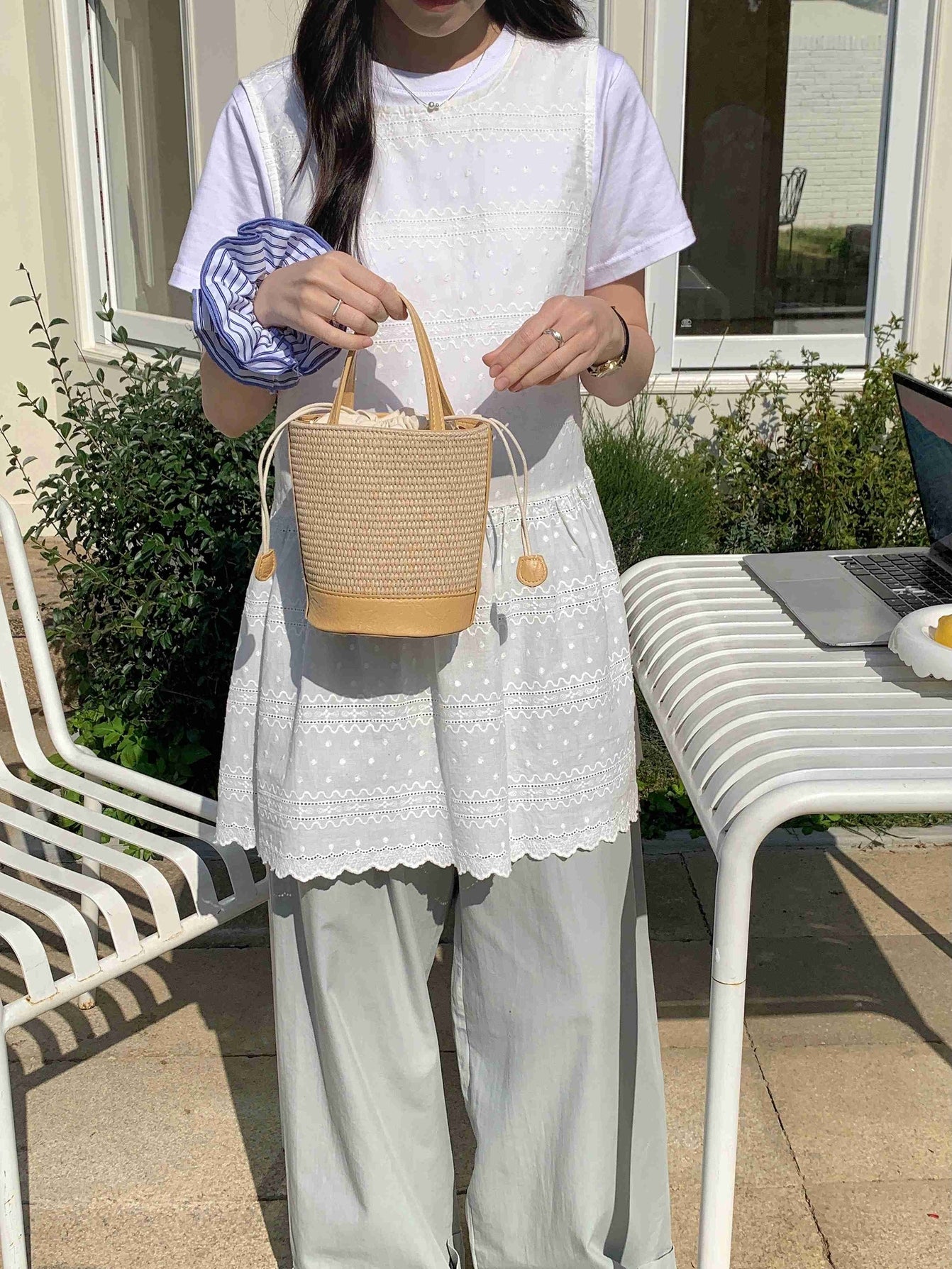 Beige straw bucket bag