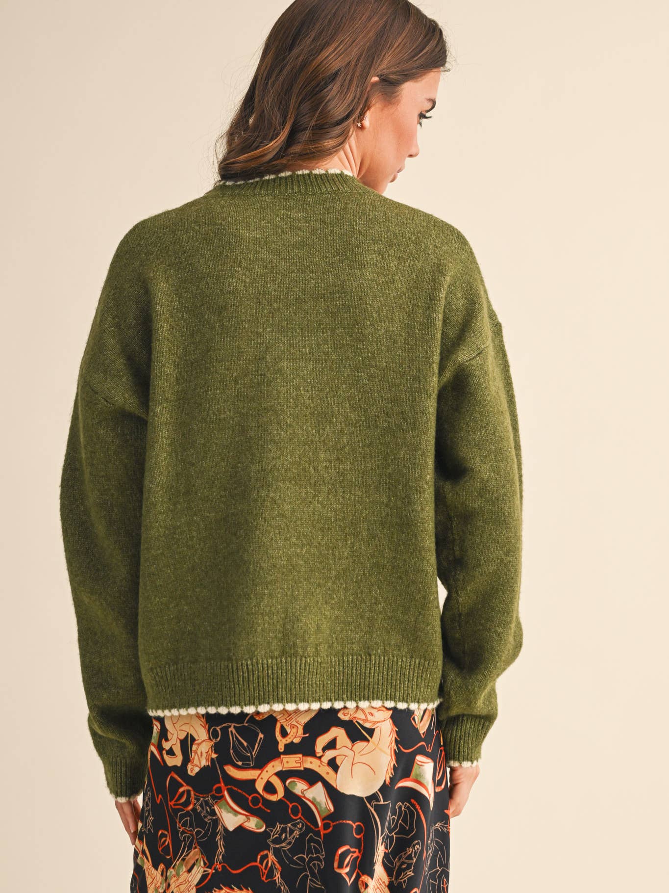 Green scalloped sweater