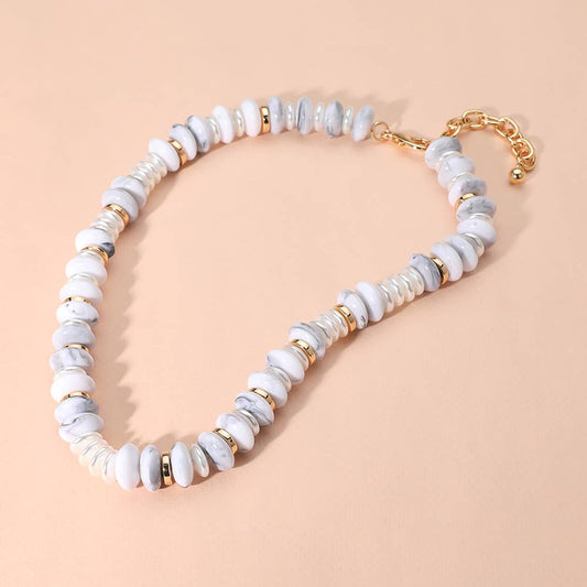 White beaded necklace