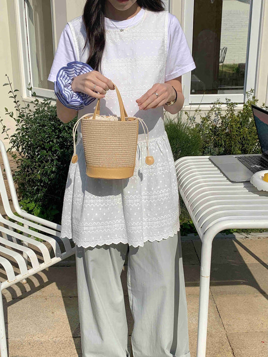 Beige straw bucket bag