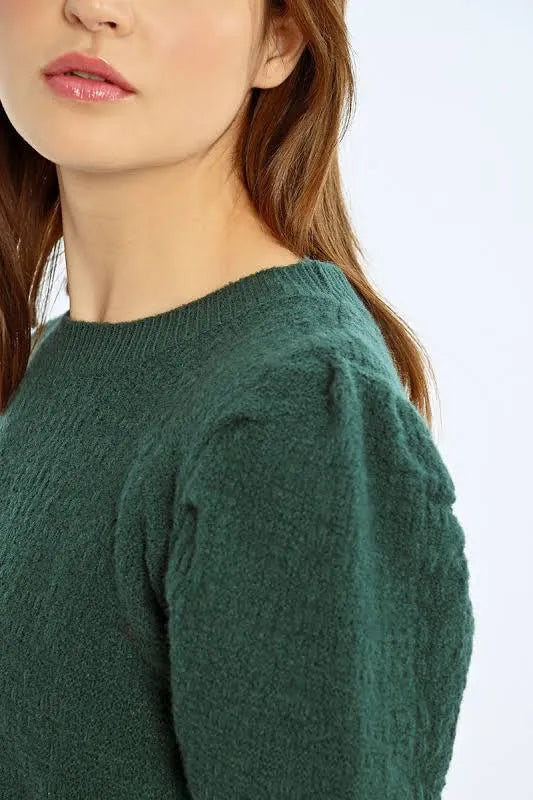 The jade sweater